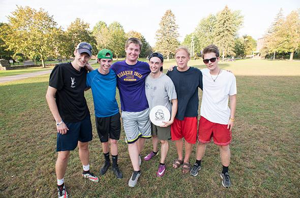 Ultimate Frisbee Club players pose for a photo