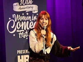 Tina Friml at a comedy venue