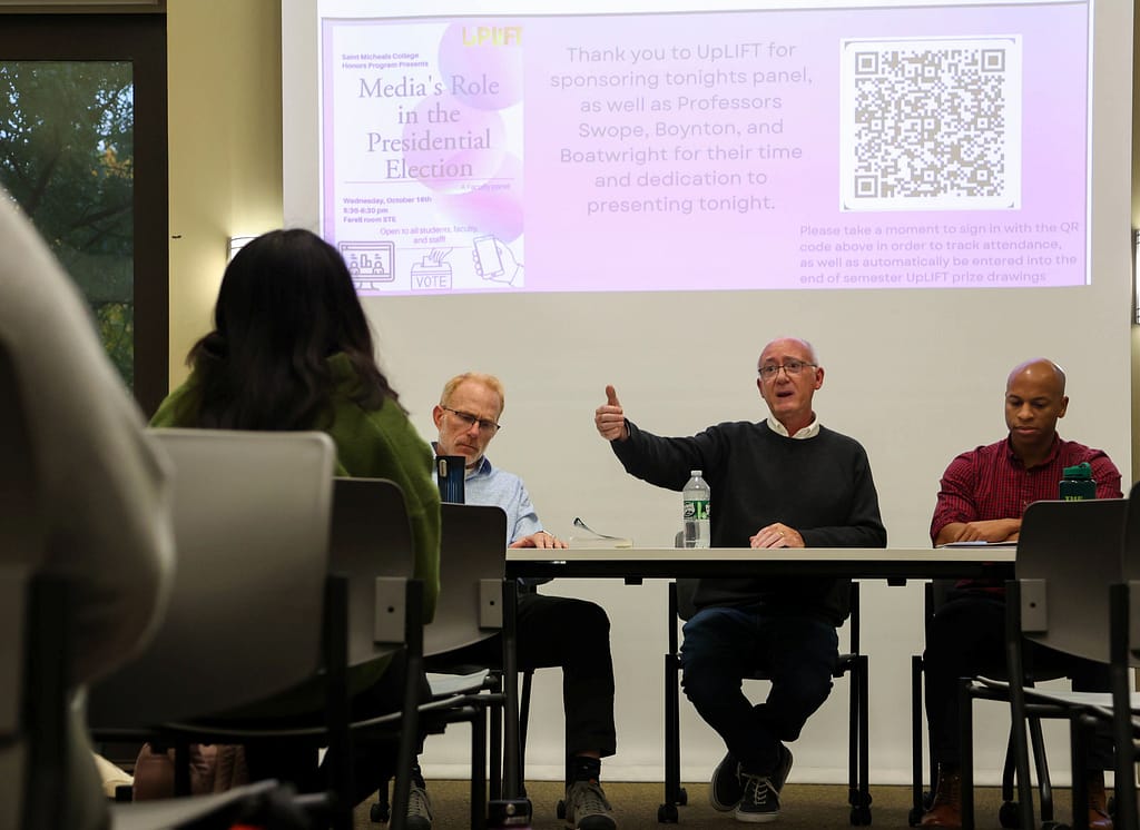 Professors Jerry Swope of the Digital Media and Communications Department, David Boynton of the Psychology Department, and Stephon Boatwright of the Political Science and International Relations Department serve on a panel in October 2024 about the media's impact in presidential elections. (Photo by Abbey Gyurko '27)