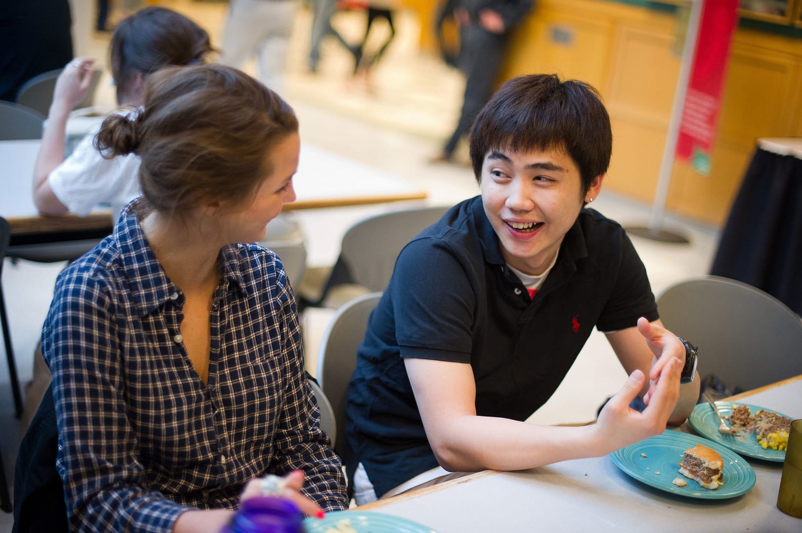 Students chat in the Green Mountain Dining Room in Alliot Hall at Saint Michael's College.