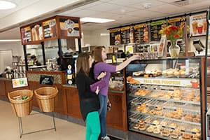 Students grab a bite to eat at Einstein's.