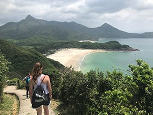 student admiring view of Hong Kong natural landscape 