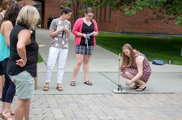 Students experiment during a Graduate Education course over the summer at Saint Michael's College. 