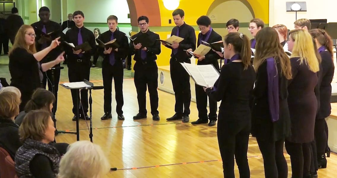 Erin Grainger conducts the Saint Michael's College Chorale for a performance earlier this year prior to the onset of the coronavirus pandemic.